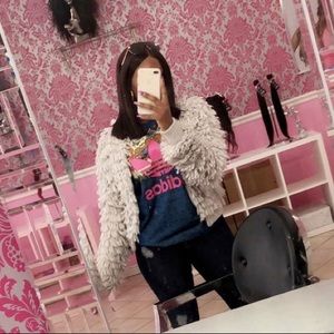 Fluffy trendy open sweater